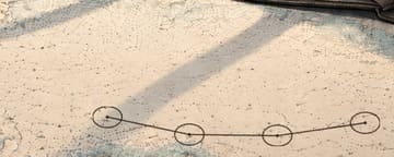 The pencilled course after letter three: 3 legs.
