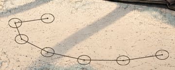 The pencilled course after letter six: 6 legs.